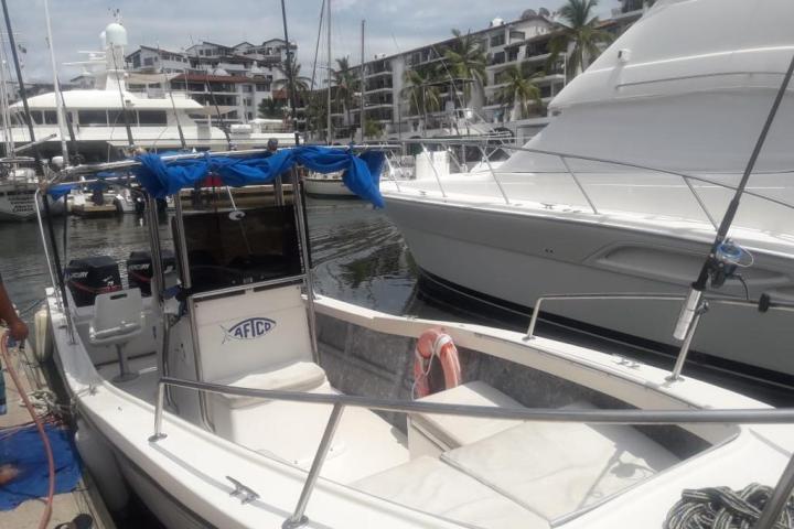 a boat docked at a dock